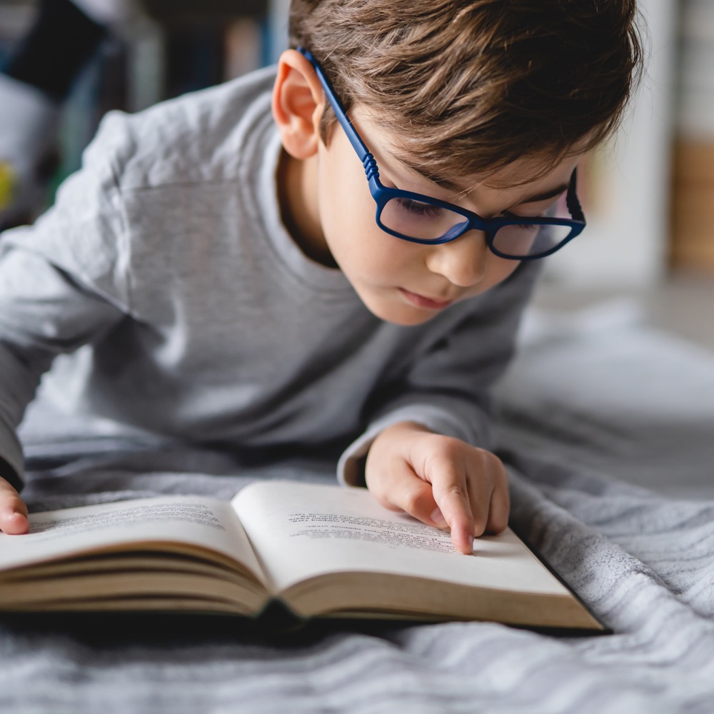 A young reader exploring a book